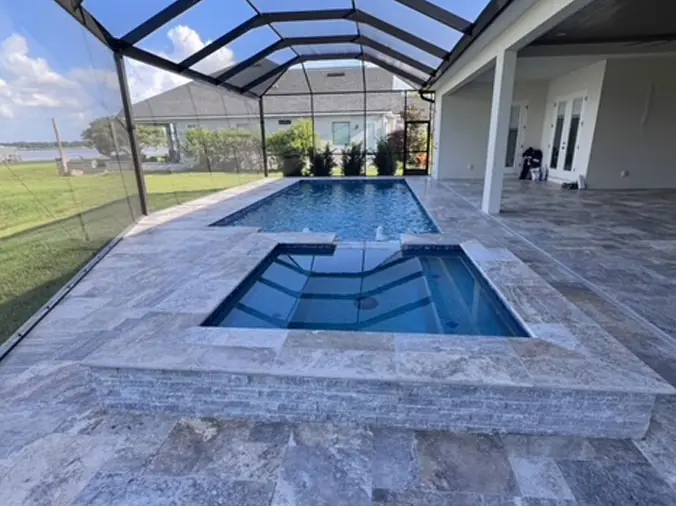 Private swimming pool with glass encolsure